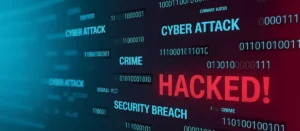 Digital screen displaying various cyber security terms like "CYBER ATTACK", "CRIME", and "HACKED!" in glowing text, highlighting the urgency and severity of digital security breaches.