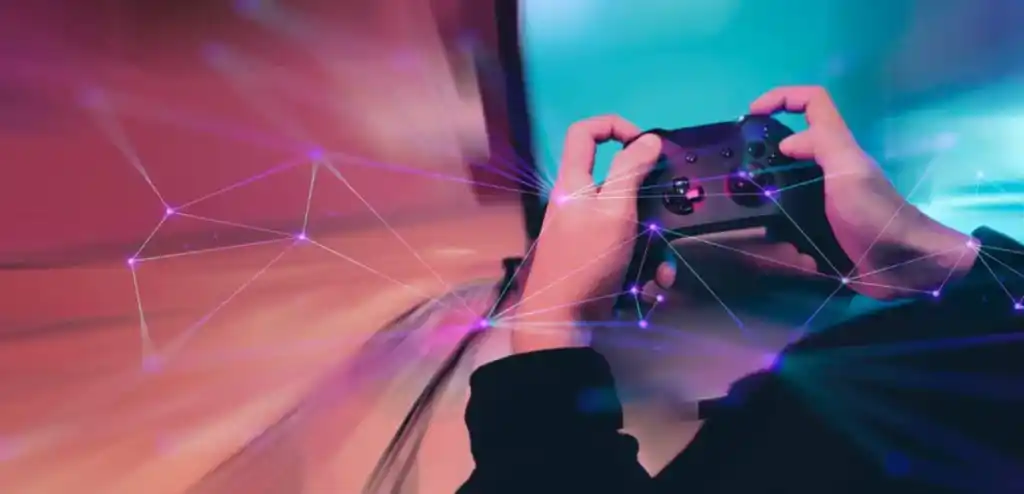 Close-up of a person's hands holding a video game controller, with vibrant pink and turquoise lighting and dynamic digital graphics enhancing a futuristic gaming experience.