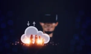 A person in a virtual reality headset interacts with a glowing cloud icon, representing cloud computing technology.