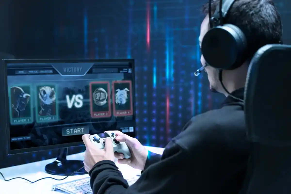 Person gaming on computer setup