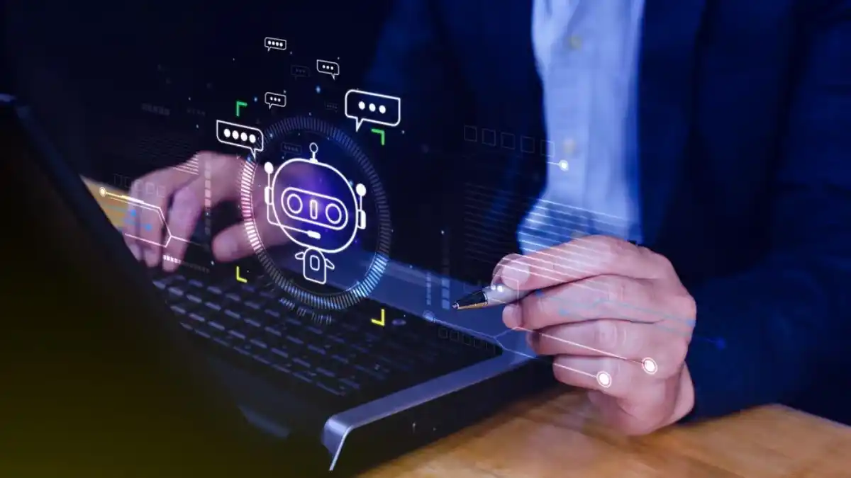 Person using laptop with chatbot