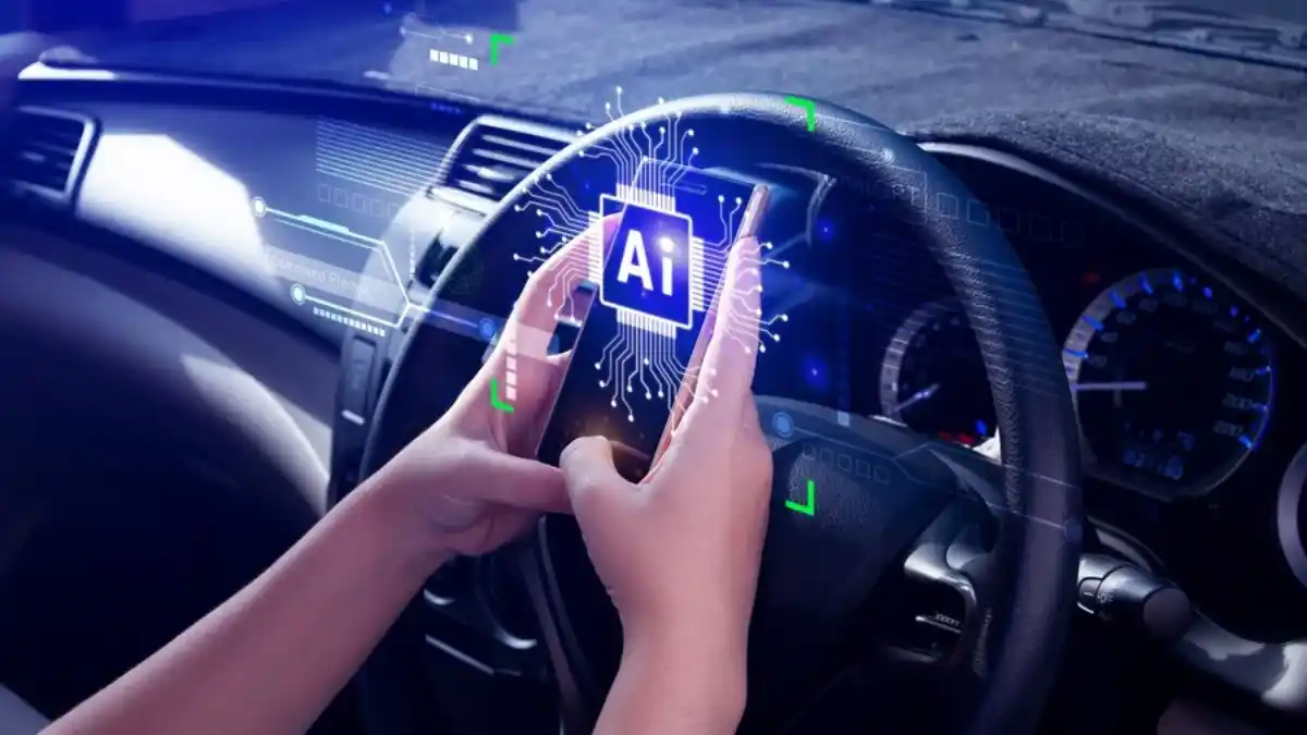 Hands holding phone in car